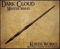 the dark cloud master wand is on display in front of an old parchment paper background