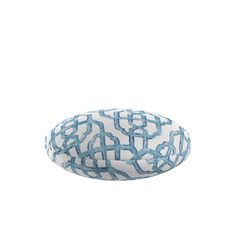 a blue and white bowl sitting on top of a table