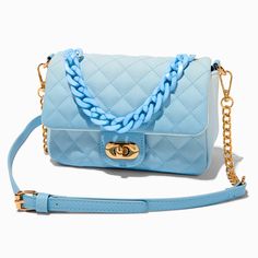 This crossbody purse features a gold-tone buckle that opens wide for easier access to your essentials. The ombre bag is decorated all over with a quilted design, and comes with a gold-tone chain and crossbody strap.8W x 6H x 2D in.20.32W x 15.24H x 5.08D cm.Hardware Finish: Gold-toneClosure: BuckleMaterial: PU - Claire's Blue Ombre Quilted Crossbody Bag Trendy Blue Quilted Bag, Chic Blue Quilted Bag, Chic Blue Quilted Shoulder Bag, Blue Quilted Crossbody Bag, Ombre Bag, Purse For Teens, Piercing Kit, Blue Purse, Fashionable Jewelry