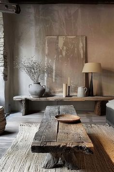 a living room filled with furniture and a wooden table