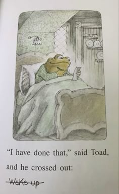 the frog is sleeping in bed with his head on the pillow, and he's reading