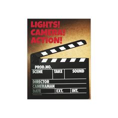 a movie clapper with the words lights camera action