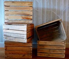 several wooden crates stacked on top of each other