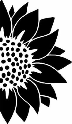 a black and white flower is shown in the shape of a sunflower with large petals