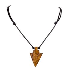 a wooden necklace with black leather cord and an arrow shaped pendant on the front of it