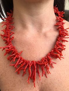 "Red Coral fringed Necklaces mounted on silver 925 . -Given the authenticity of the product, both the shape and the workmanship may vary, making each piece of jewelry unique. A richly fringed necklace of Mediterranean coral in a magnificent colour. Red coral is connected to the first chakra, the root chakra stimulates vital energy and vitality. It eliminates energy imbalances due to negative moods, opens the heart with the power of love and is considered a stone of sensuality and affection.  Coral is a colony of living microorganisms in a calcareous formation that grows in the form of a small tree at depths of 50 to 150 metres Coral has fascinated mankind since ancient times and its origin has been a source of speculation among early naturalists for centuries. Many people believed that cor