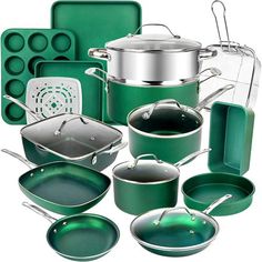 an assortment of green pots and pans