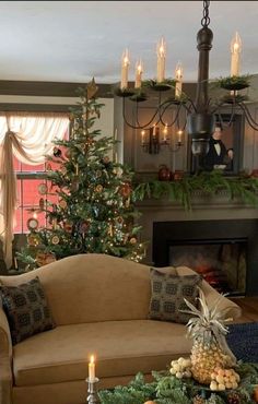 a living room filled with furniture and a christmas tree