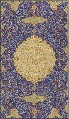 an intricately designed rug with blue, yellow and red colors