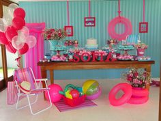 a birthday party with balloons and decorations