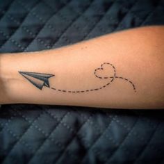 a person's arm with an airplane on it and the words, always on the move?