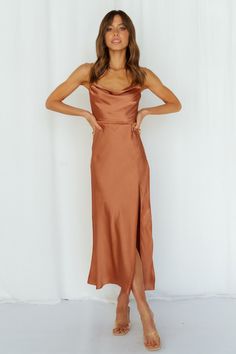 Length from shoulder to hem of size S: 103cm. Rust midi dress. Lined. Cold hand wash only. Model is a standard XS and is wearing XS. True to size. Lightweight, woven satin fabric. Invisible back zipper. Polyester. With this cute AF satin midi, you'll be hypnotizing everyone in the room. Get ready to hear about everyone's desires. The Stand On My Own Midi Dress has a lovely open back, with a straight neckline and boning at the torso. Style yours with strappy heels and gold adornments. Dress Date Night, Midi Dress Formal, Dress Stand, Rust Dress, On My Own, Dress Satin, Satin Midi Dress, Dress Formal, Blue Midi Dress