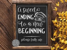 a chalkboard sign that reads, sweet ending to a new beginning please take one