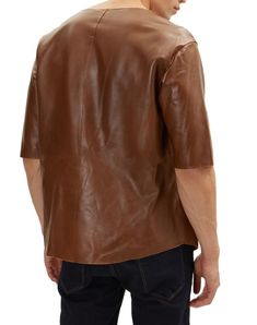 Looking for a way to upgrade your style with a touch of luxury? Look no further than our Brown Leather T Shirt! This luxurious tee is made from premium sheepskin leather and features a soft, supple texture that feels amazing against the skin. The polyester lining ensures ultimate comfort, so you can wear it all day long. Our Brown Leather T Shirt is versatile enough to be dressed up or down. Pair it with jeans and sneakers for a casual look, or dress it up with a pair of slacks and dress shoes f Brown Leather Casual Tops, Casual Brown Leather Tops, Casual Brown Leather Top, Modern Leather Tops For Workwear, Classic Leather Tops For Fall, Leather Short Sleeve Tops For Fall, Brown Leather Top For Fall, Casual Leather Short Sleeve Tops, Casual Leather Tops With Short Sleeves