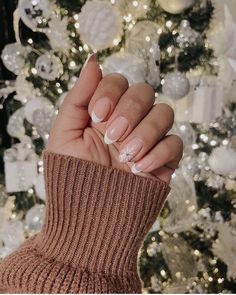 Cute Short Almond Nails Christmas, Gel X Nails Almond Winter, French Nail Designs Christmas, December French Nails, Almond French Tip Nails With Snowflake, Subtle Christmas Nails Almond, Short Holiday Acrylic Nails, Christmas Nails Simple Classy Almond, Holiday Almond Nails Winter