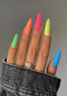 Explore the bold trend of neon nails with 25 vibrant ideas for summer. From neon French tips and ombre designs to geometric patterns and animal prints, discover how to make a statement with neon nail art. Get inspired by flames, solid shades, stripes, skittle nails, and neon accents. Perfect for standing out! Multicolored Nail Designs, Nail Ideas Pastel Colors, Colourful Nail Ideas, Neon Coffin Nails, Neon Nails Ideas, Neon French Tips, Skittle Nails, Neon Nail Art Designs