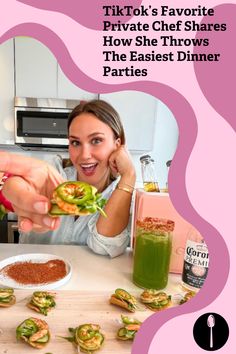 a woman is eating some food at the table with other foods and drinks around her