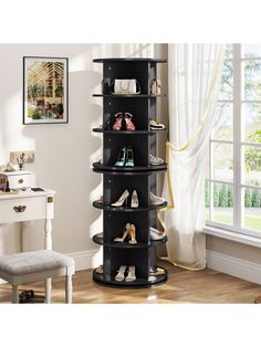 a tall black shelf with shoes on it