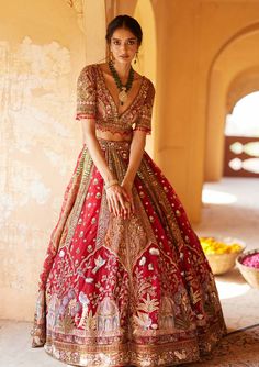 Roqa's 'The Odyssey' collection introduces a lehenga that exudes grace and tradition. Infused with a lively story delicately embroidered on the lehenga skirt, it's a tribute to the ... Tarun Tahiliani Lehenga, Maroon Bridal Lehenga, Maroon Lehenga, Red Lehenga Choli, Bridal Lehenga Collection, Designer Bridal Lehenga