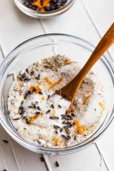 the ingredients for lemon and lavender infused sugar in a glass bowl