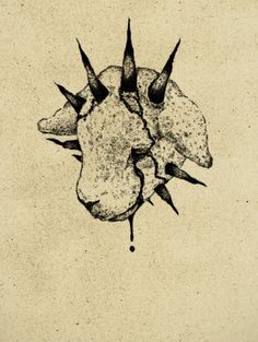 a black and white drawing of two sheep heads with spikes on it's head