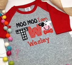 a gray and red shirt with a cow on it that says moo moo i am tw