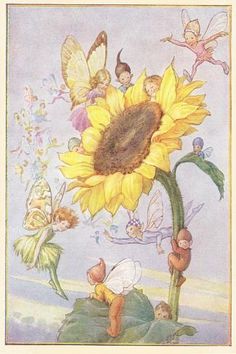 a sunflower with little fairy figurines sitting on it's back and some flowers in the foreground