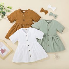 Toddler Baby Kids Girl Dresses Outfits Solid Color Short Sleeves Single Breasted Dress Headband 2Pcs Clothes Set Features: Cotton blend MATERIAL--- Soft and skin-friendly, breathable and sweat-absorbing, comfortable to wear. POPULAR DESIGN---Solid color V-neck short-sleeved single-breasted dress with headband, casual and lovely. Three colors: white/green/brown. OCCASIONS---The casual dress suit is suitable for spring, summer, daily life, birthday party, outing, vacation trip, playground, etc. FI Girls Short Dresses, Corduroy Overall Dress, Girls Dress Outfits, Baby Girl Shorts, Dresses Outfits, Dress Suit, Solid Color Dress