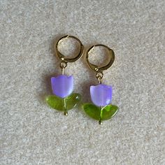 - Pretty Floral Earrings Featuring Light Purple Tulips - Handmade (By Myself) And Packaged With An Earring Card, Wrapped In A Cellophane Bagperfect For Gifts! - Beads Are Glass - These Are Pretty Lightweight - On Gold Colored Huggie Hoop Earring Hooks Check Out My Closet For More Handmade Jewelry Tags: Dangly Earrings, Dangle Earrings, Floral Earrings, Flower, Pastel Earrings, Tulips, Spring Earrings, Summer Earrings **Add 3 Jewelry Items Marked “3 For $20” To Your Bundle And I Will Send You An Light Purple Tulips, Vital Spring, Flower Pastel, Tulip Earrings, Tulips Spring, Pastel Earrings, Crystal Pearl Earrings, Rose Gold Earrings Studs, Earring Card