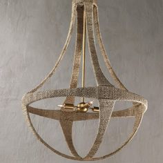 a gold chandelier hanging from a ceiling