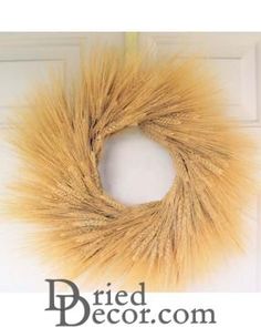 a close up of a door with a fake fur wreath on the front of it