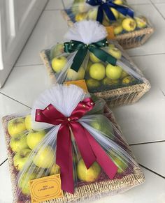 Apples and oranges wrapped in cane basket in white and burgundy theme for thanksgiving. Fruit Basket Ideas Gift, Traditional African Wedding, Hampers Wedding, Wedding Hampers, Apples And Oranges, Fruit Hampers