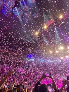 confetti is thrown in the air at a concert