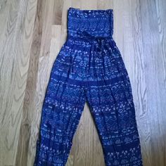 Sleeveless Pattern Jumpsuit NWOT Light and airy with bandeau tube top, tie at waist and gathered at the ankle. Navy blue with light blue and orange accents. Sans Souci Pants Jumpsuits & Rompers Orange Accents, Jumpsuit Pattern, Tube Top, Blue Orange, Two Piece Pant Set, Pant Jumpsuit, Jumpsuit Romper, Jumpsuit, Pants For Women