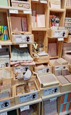 the shelves are filled with many different types of crafting supplies and crafts on display