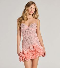 Always charm and bring the party in the Rosalie mini dress to prom or birthdays! Made from a mesh fabric, this dress is embellished with glam details like rhinestones and faux pearls to make you standout. The sweetheart neckline and adjustable spaghetti straps enhance your natural curves, while the built-in padded underwire bust offers support and a flattering silhouette. The bodycon fit and asymmetrical ruffled mini-length hem add a touch of sophistication to this luxurious dress. Complete the Glamorous Mini Mesh Dress For Party Season, Embellished Mini Dress For Homecoming Party Season, Chic Embellished Mini Dress For Homecoming, Fitted Flirty Embellished Mini Dress, Party Mini Dress With Ruffles And Sweetheart Neckline, Fitted Dress For Sweet 16 And Prom Season, Flirty Mesh Mini Dress For Party, Embellished Fitted Mini Dress For Homecoming, Fitted Mini Dress With Rhinestones For Spring