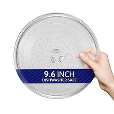 a person is holding up a dish cover with the words 9 6 inch on it