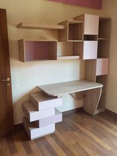 a desk and shelves in a room