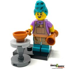 a lego man is holding a bowl and mixing it