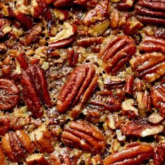 there is a lot of pecans that are on top of each other in the pie