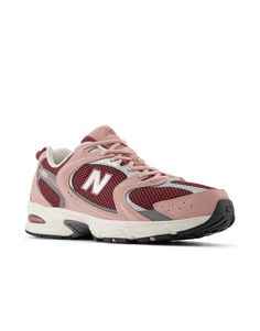 Sneakers by New Balance A pop of color Low-profile design Pull tab for easy entry Lace-up fastening Padded tongue and cuff Signature New Balance branding Durable rubber outsole Textured grip tread City Break Outfit, Nike Air Max Jordan, Balance Branding, Pink And Burgundy, Burgundy Style, Fall Lookbook, Xmas List, Pink And Silver, Winter Party Dress