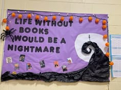 a bulletin board with halloween decorations and writing on it that says life without books would be a nightmare