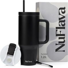 a black travel mug next to a box with a straw in it and the lid open