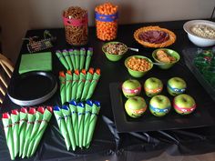 the table is set up with many snacks