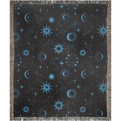 a blue and black blanket with stars, moon and crescents on the dark ground