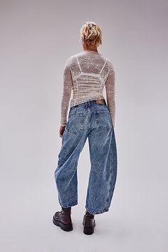 So bold barrel jeans from our We The Free collection featured in a mid-rise fit with subtle distressed detailing and wide-legs that taper at the ankle. **Fit:** Mid-rise, slouchy, relaxed fit, wide-legs, ankle-length; this style runs slightly large so we recommend sizing down one size **Features:** Zip-fly and button closure, rigid denim fabrication, belt loops at waistband, 4-pocket style, subtle distressing, tapered bottom hem, seam detail throughout **Why We | We The Free Lucky You Mid-Rise B Barrel Jeans, Lucky You, Light Beam, Baggy Fits, Sweater Skirt, Casual Wardrobe, Boho Outfits, Effortless Style, Jacket Dress