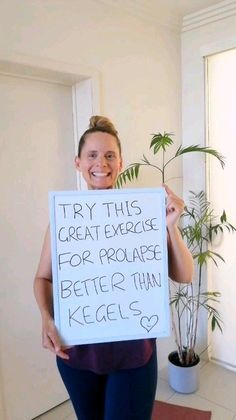 a woman holding a sign that says try this great exercise for progress better than kegel's