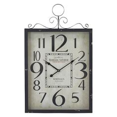 a square metal clock with numbers on the front and sides, hanging from an iron frame