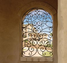 a window that has a view of a building through it