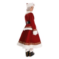 a woman dressed in a santa claus costume